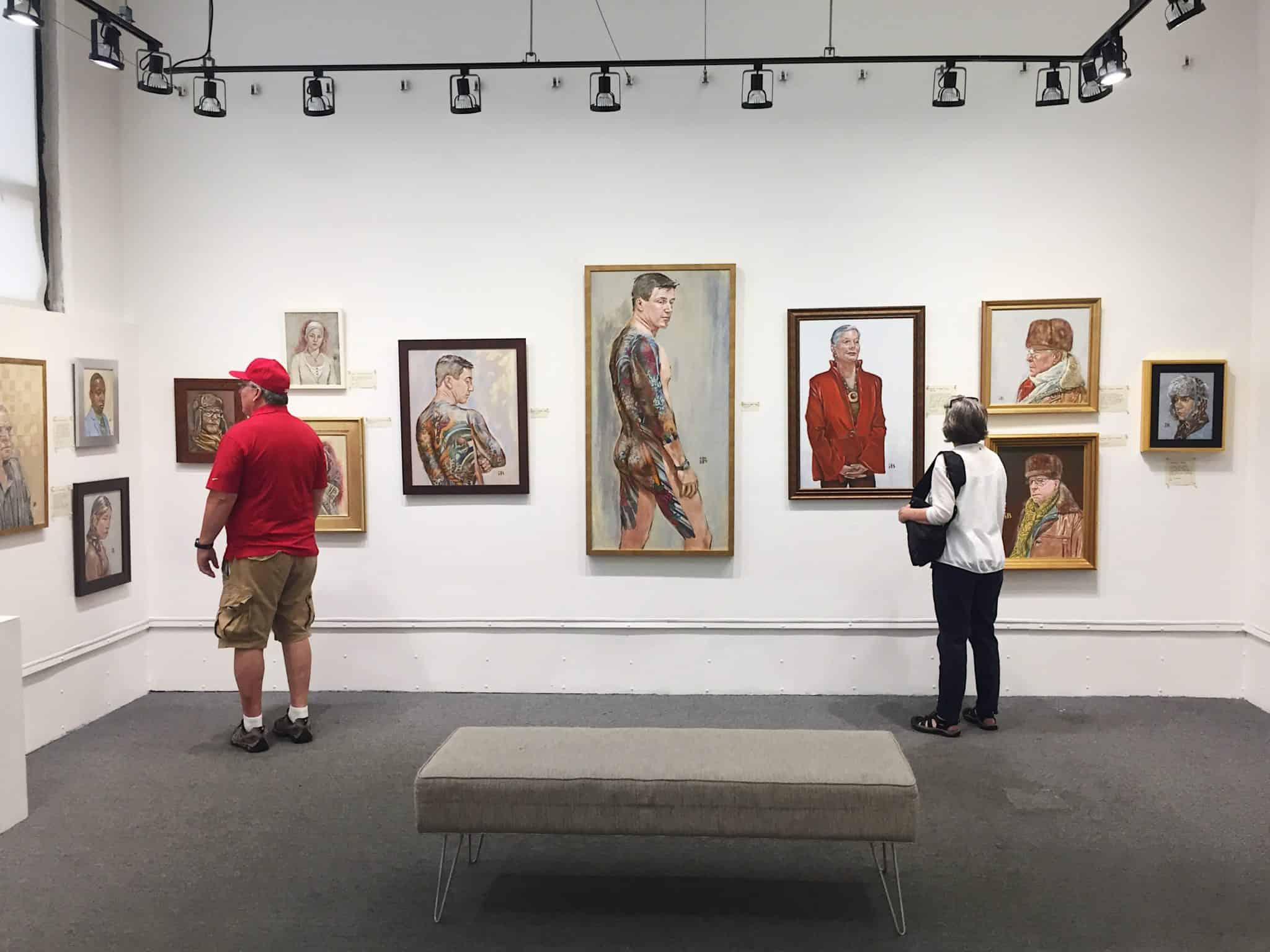 Exhibit view of "A Murder in Bruges: Cast of Characters"
