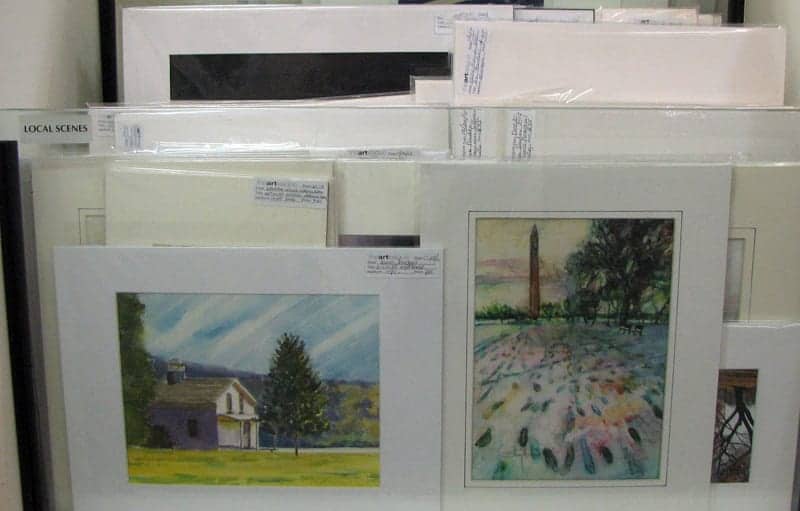 Unframed pieces in the Local Scenes bin include these scenes of Alexandria's Jones Point Lighthouse and the National Mall.