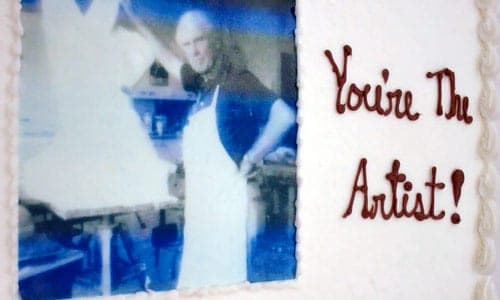 The retirement party cake, with Chuck and one of his favorite sayings.