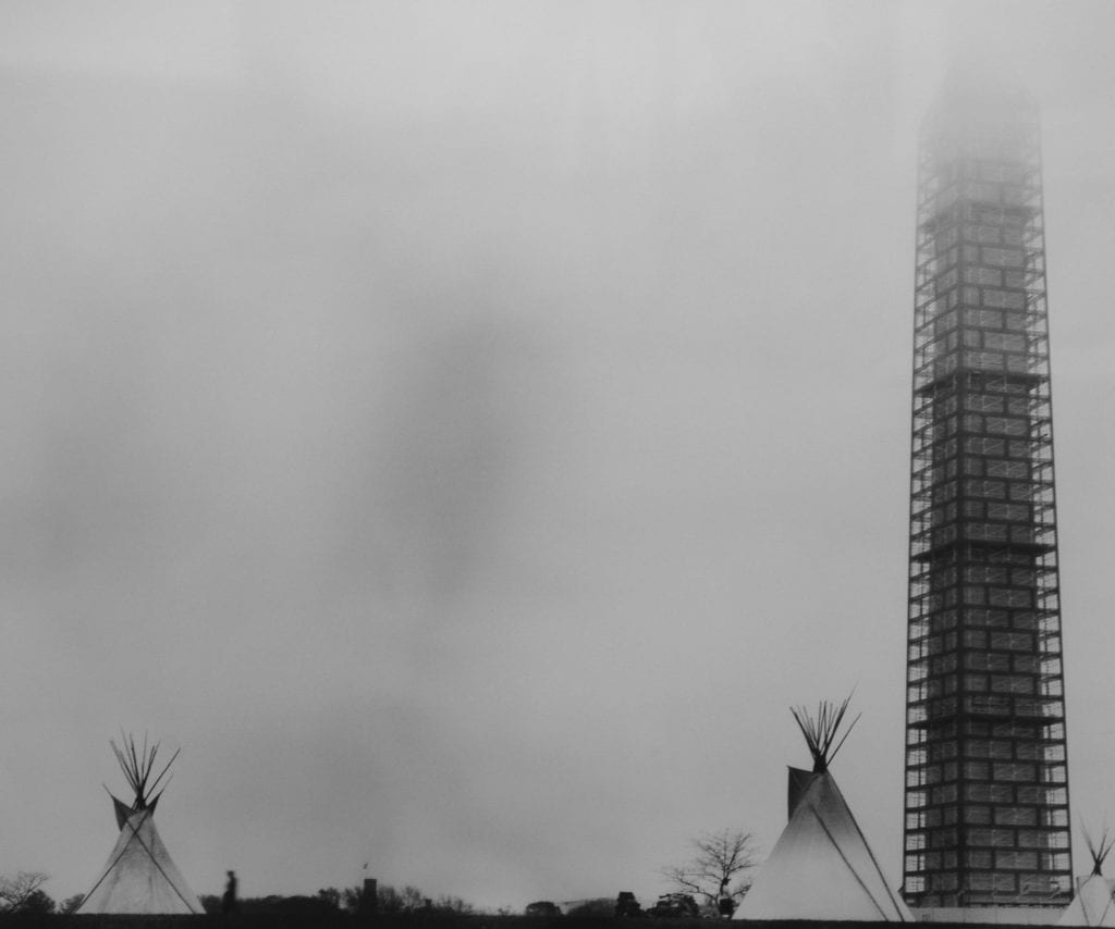 Teepees and Washington Monument, photograph by Dede Faller.