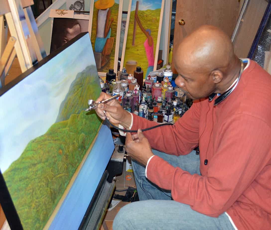 DesRoches painting with the airbrush