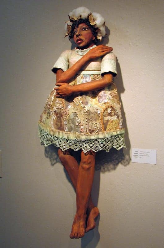 A Common Thread by Kathlyn Avila, which incorporates clay, fabric, cotton, photographs, and encaustic, won the Urquhart Award for best in show. Watch this blog for a Q&A with the artist.