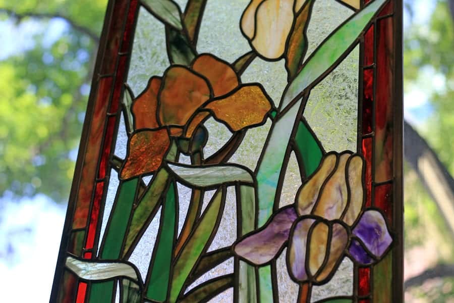 Triple Iris, glass, lead, and zinc by Stephen Sherwin.