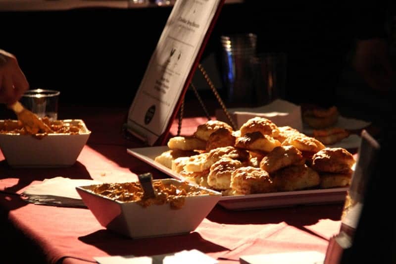 Cheddar drop biscuits with ancho chile-honey butter were a hit at Bastille's table.