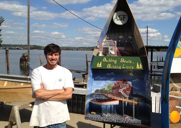 Alexandria Seaport Foundation's Anthony Ness with his boat.