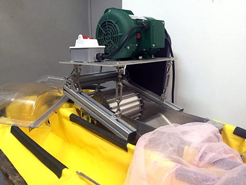This industrial paper beater shreds the fabric into pulp that can be used to make paper.