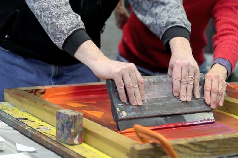 Trying out silk screen printing at Artfête.