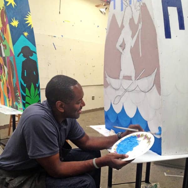 Steve Prince works on an Art Boat.