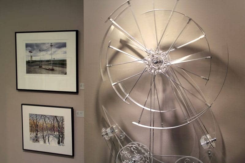 Wheel by Larry Fransen, foreground.
